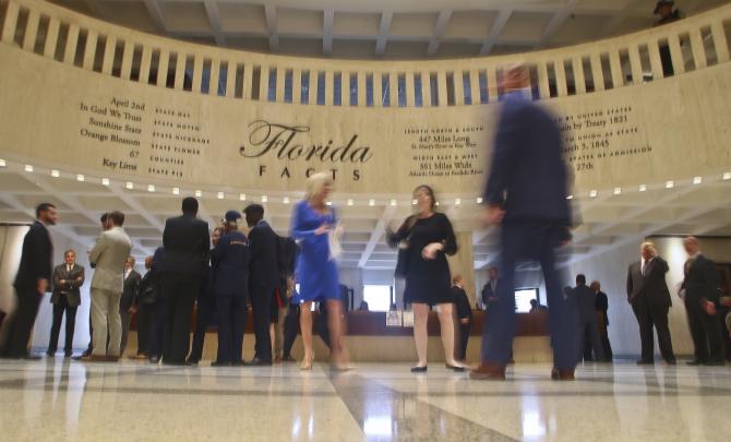 legislators, lobbyists, and demonstrators in Florida Capitol