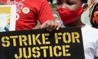 Strike for justice protesters are seen Monday, July 20, 2020, in Milwaukee. 