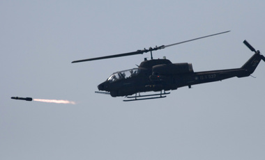 A U.S. made AH-1W attack helicopter launches a Hellfire missile Thursday, July 20, 2006, in Ilan, Taiwan. 